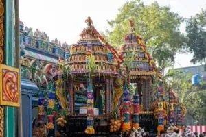 Vibrant decorated theru float during a traditional festival in Matale, capturing cultural essence and artistry.